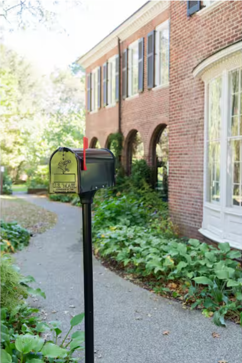 Installed metal mailbox in front of a home