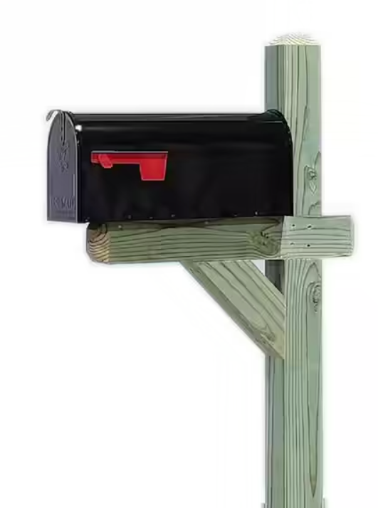 Black mailbox mounted on wood post